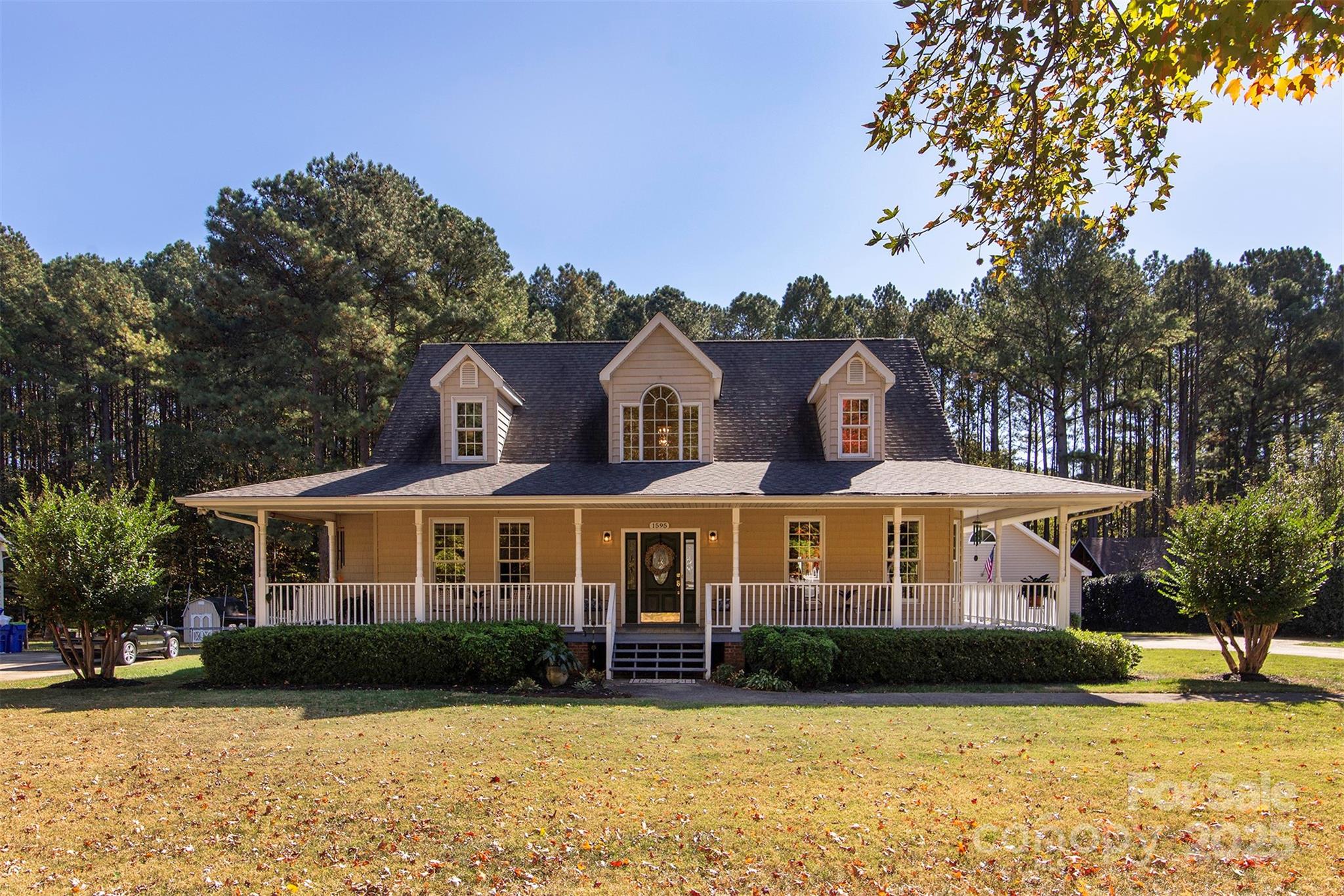 1595 High Ridge Drive Stanley, NC 28164 - Photo 2 of 32 a front view of building with yard and parking