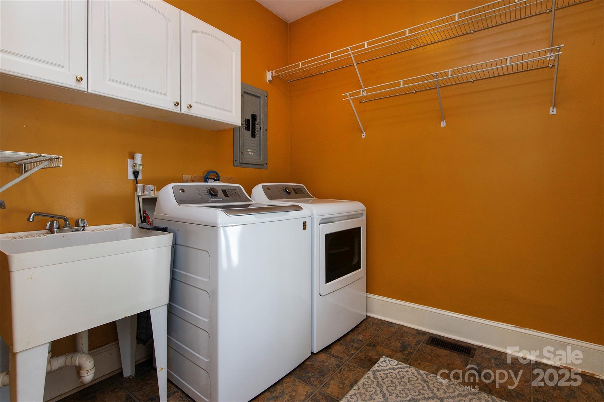1595 High Ridge Drive Stanley, NC 28164 - Photo 26 of 32 a utility room with dryer and washer