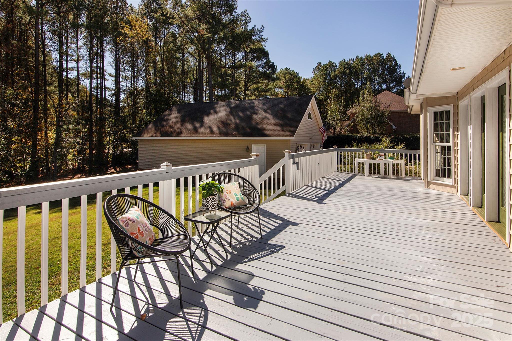 1595 High Ridge Drive Stanley, NC 28164 - Photo 29 of 32 a view of a chair and tables on the roof deck
