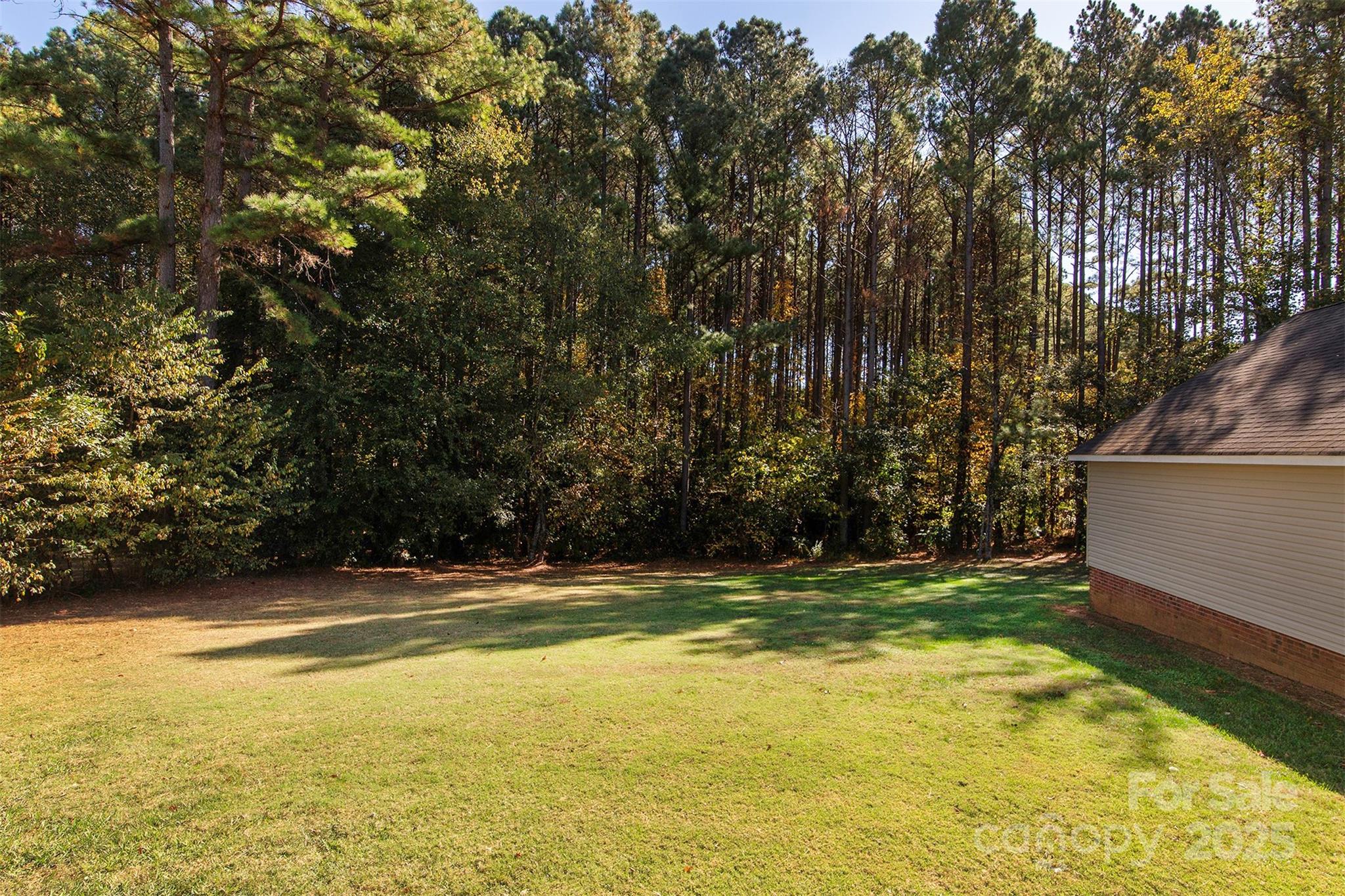 1595 High Ridge Drive Stanley, NC 28164 - Photo 30 of 32 a view of a swimming pool with an outdoor space and seating area