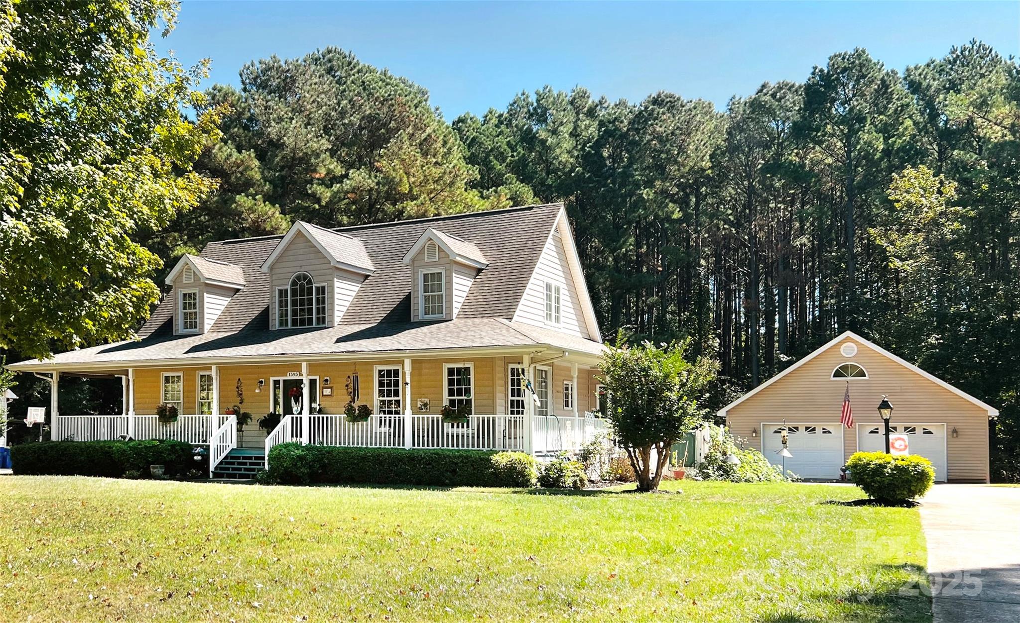 1595 High Ridge Drive Stanley, NC 28164 - Photo 31 of 32 a front view of a house with a yard