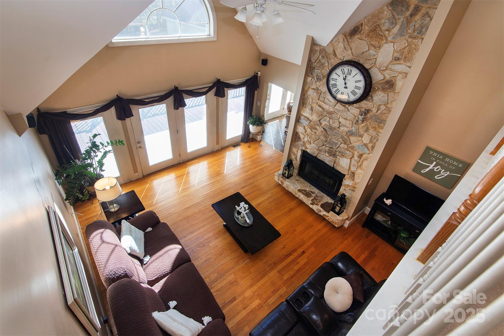 1595 High Ridge Drive Stanley, NC 28164 - Photo 5 of 32 a living room with furniture and a fireplace