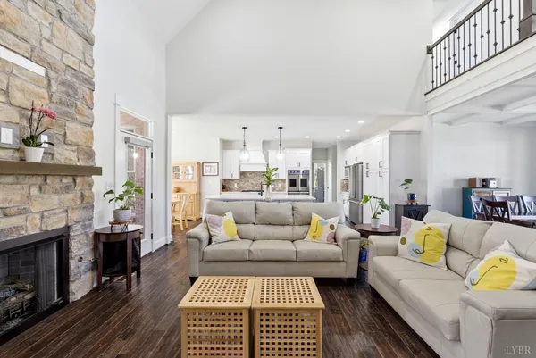 a view of a patio with table and chairs and wooden floor
