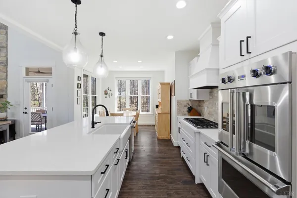 a balcony view with a seating space