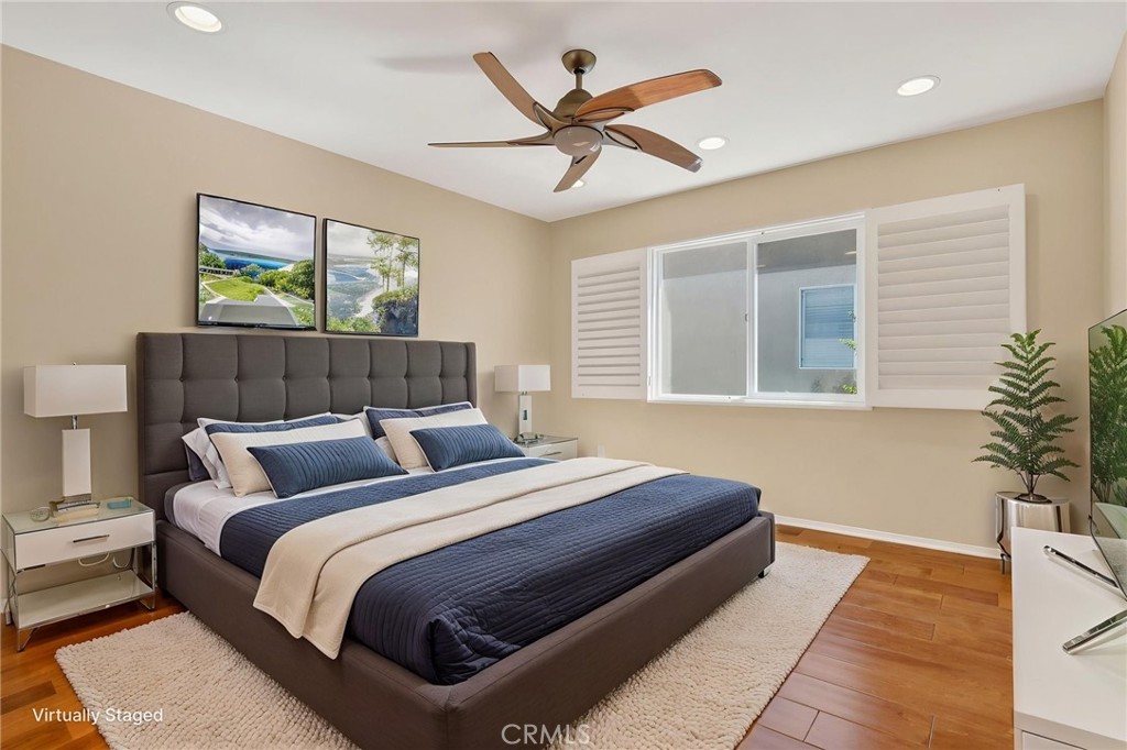 20543 Pesaro Porter Ranch Porter Ranch, CA 91326 - Photo 52 of 67 a bedroom with bed and a window