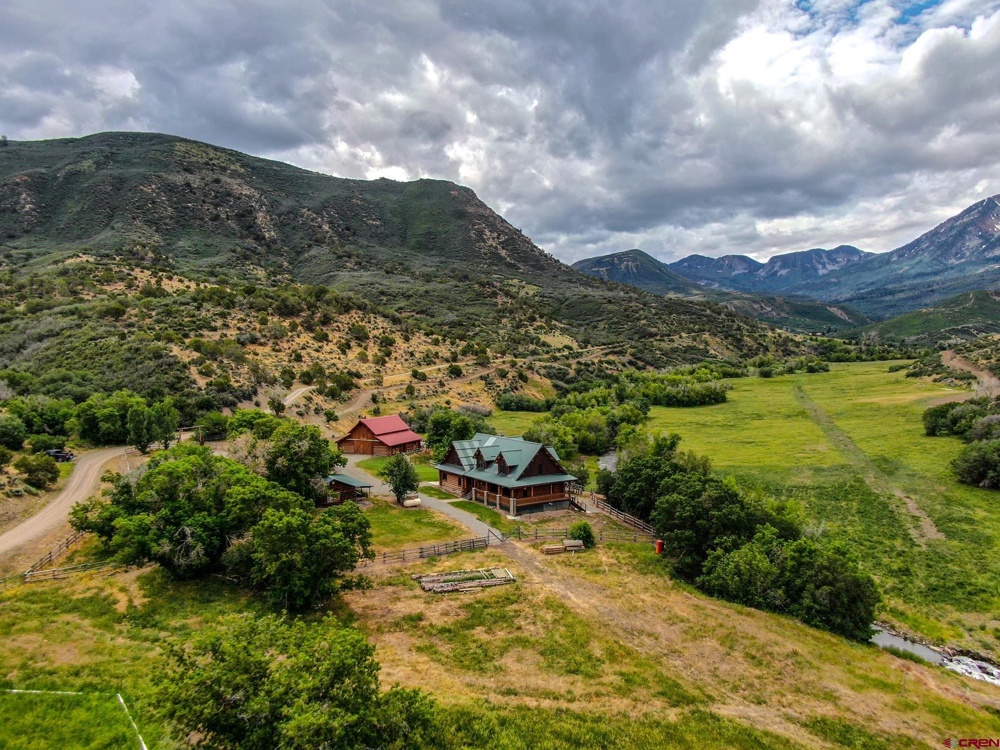 6300 Minnesota Creek Road Somerset, CO 81428 - Photo 13 of 22 a view of a lake with mountains in the background