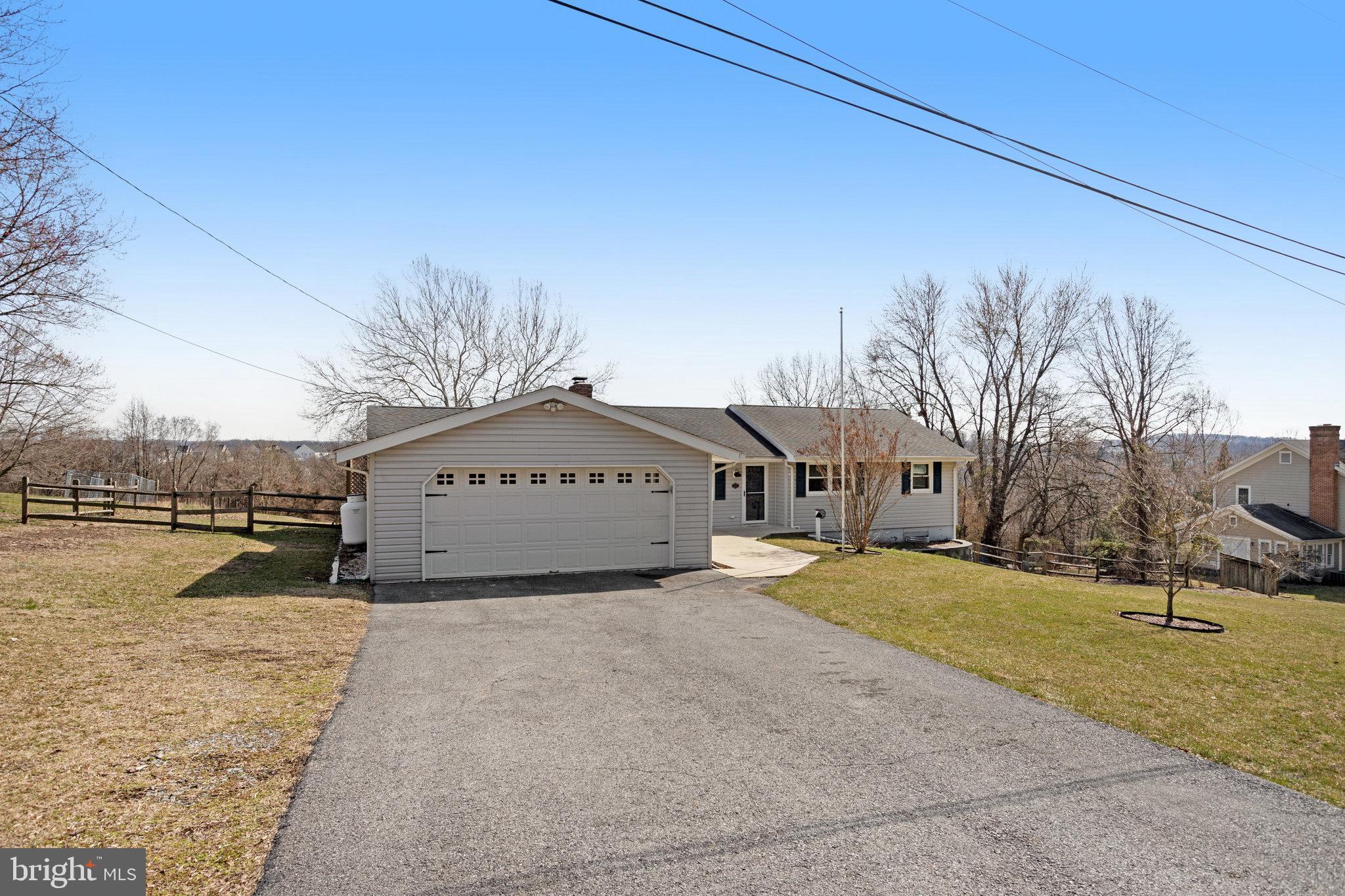 6343 Yeagertown Road New Market, MD 21774 - Photo 2 of 58 a view of a house with a yard