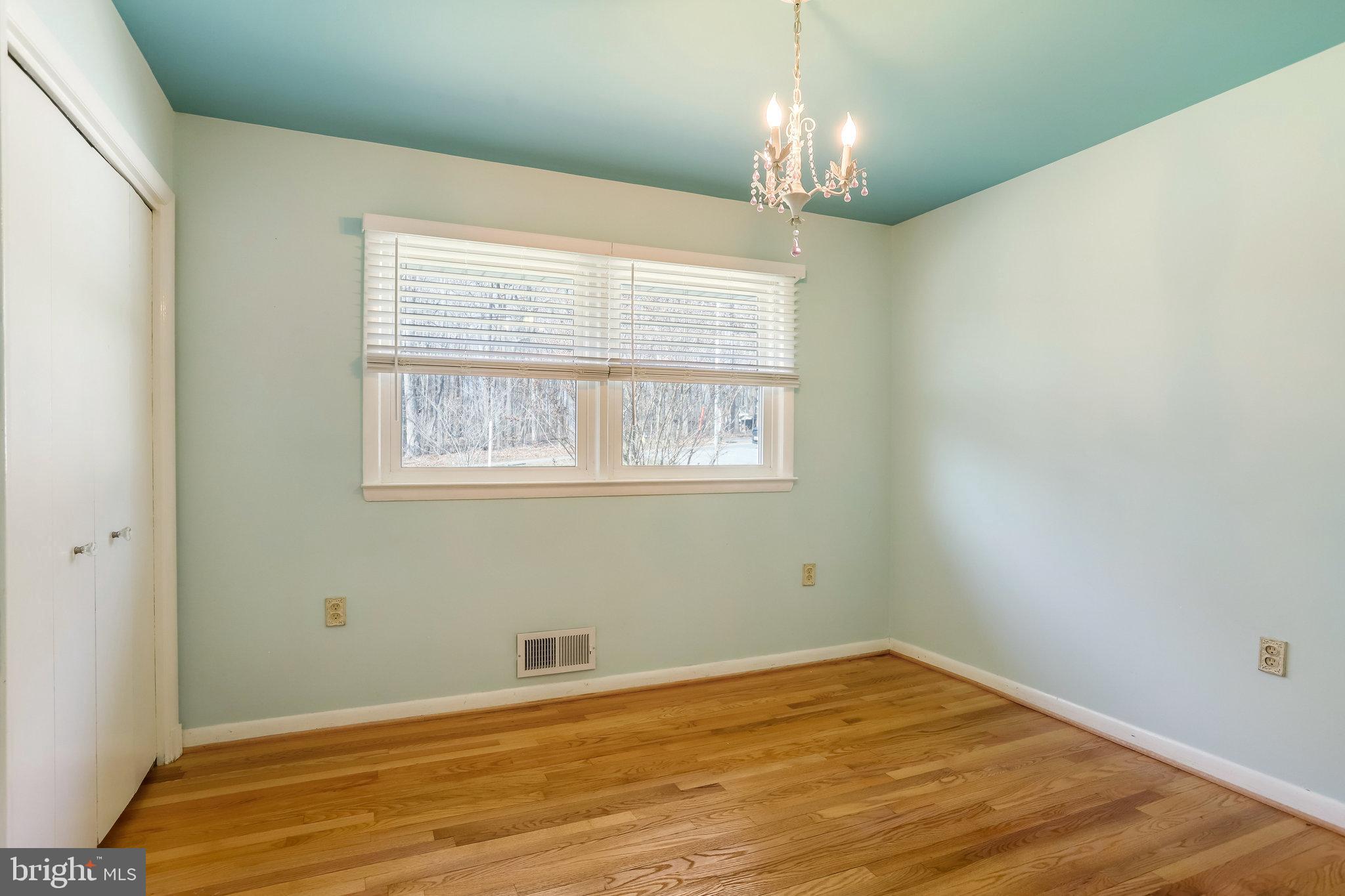 6343 Yeagertown Road New Market, MD 21774 - Photo 29 of 58 a view of empty room with wooden floor and fan