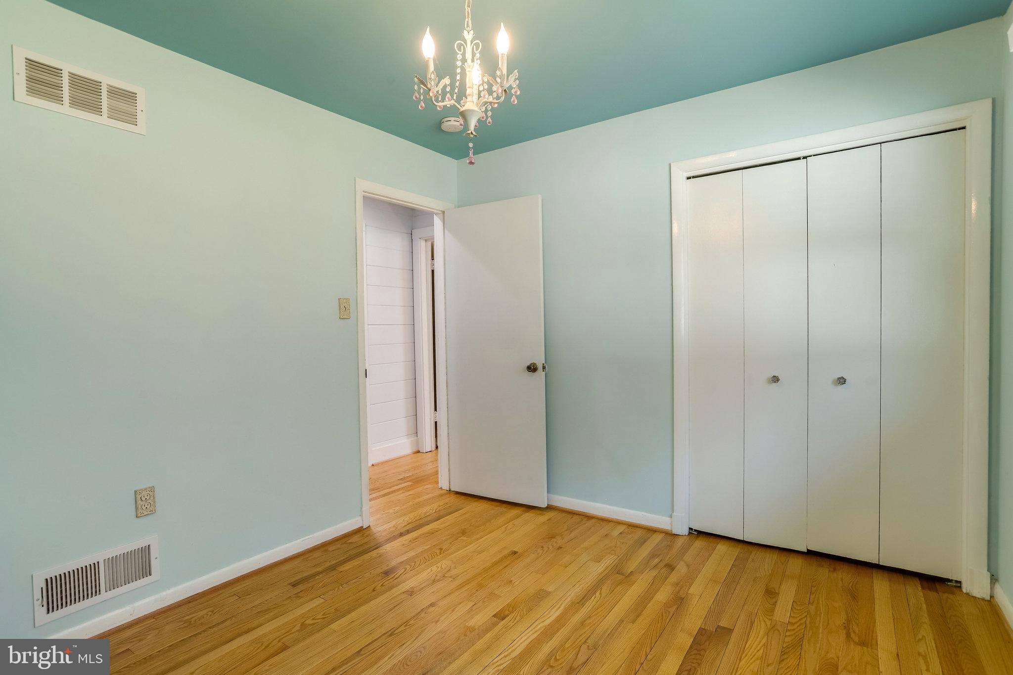 6343 Yeagertown Road New Market, MD 21774 - Photo 30 of 58 a view of an empty room with wooden floor
