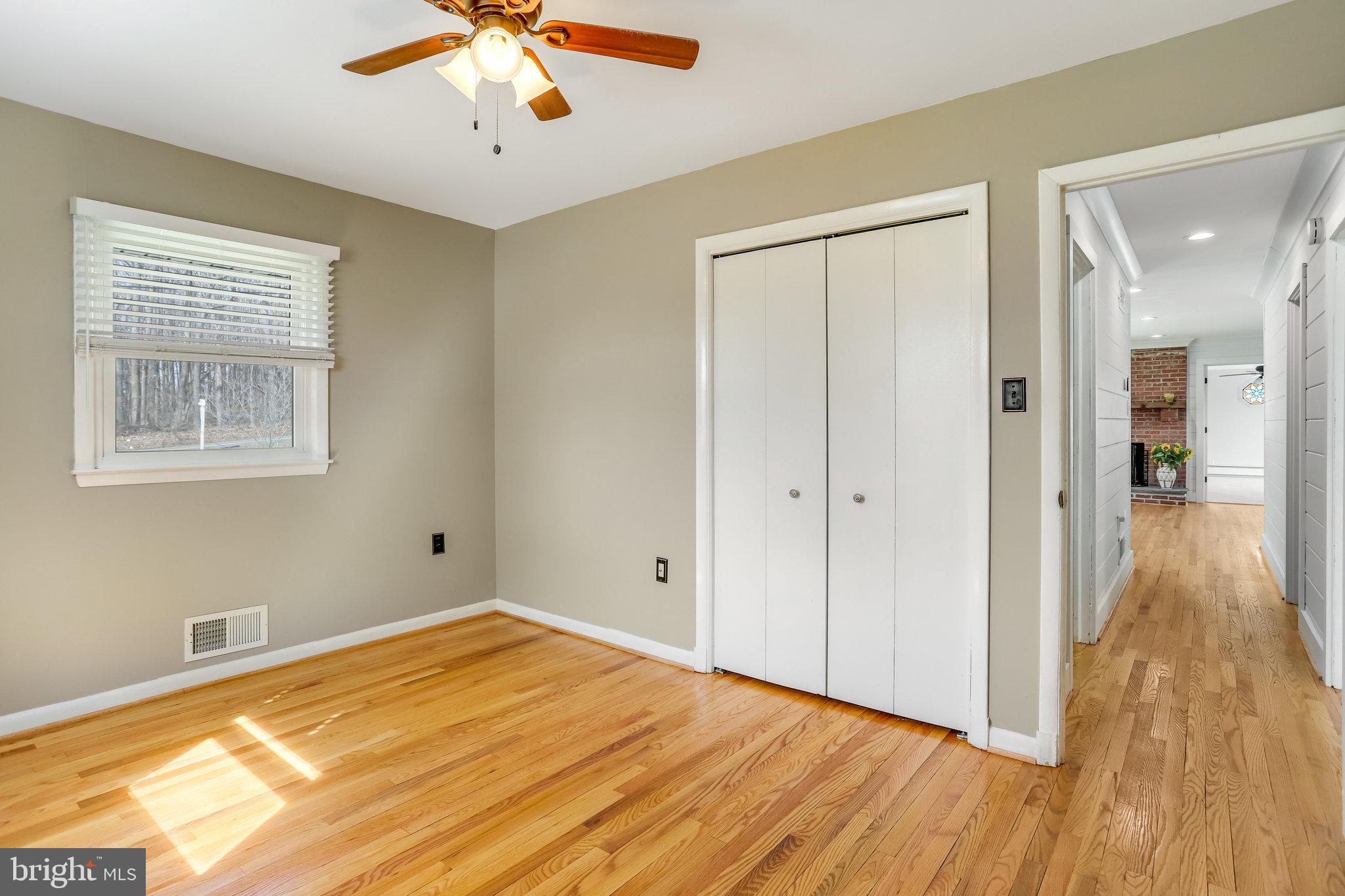 6343 Yeagertown Road New Market, MD 21774 - Photo 33 of 58 a view of an empty room with wooden floor