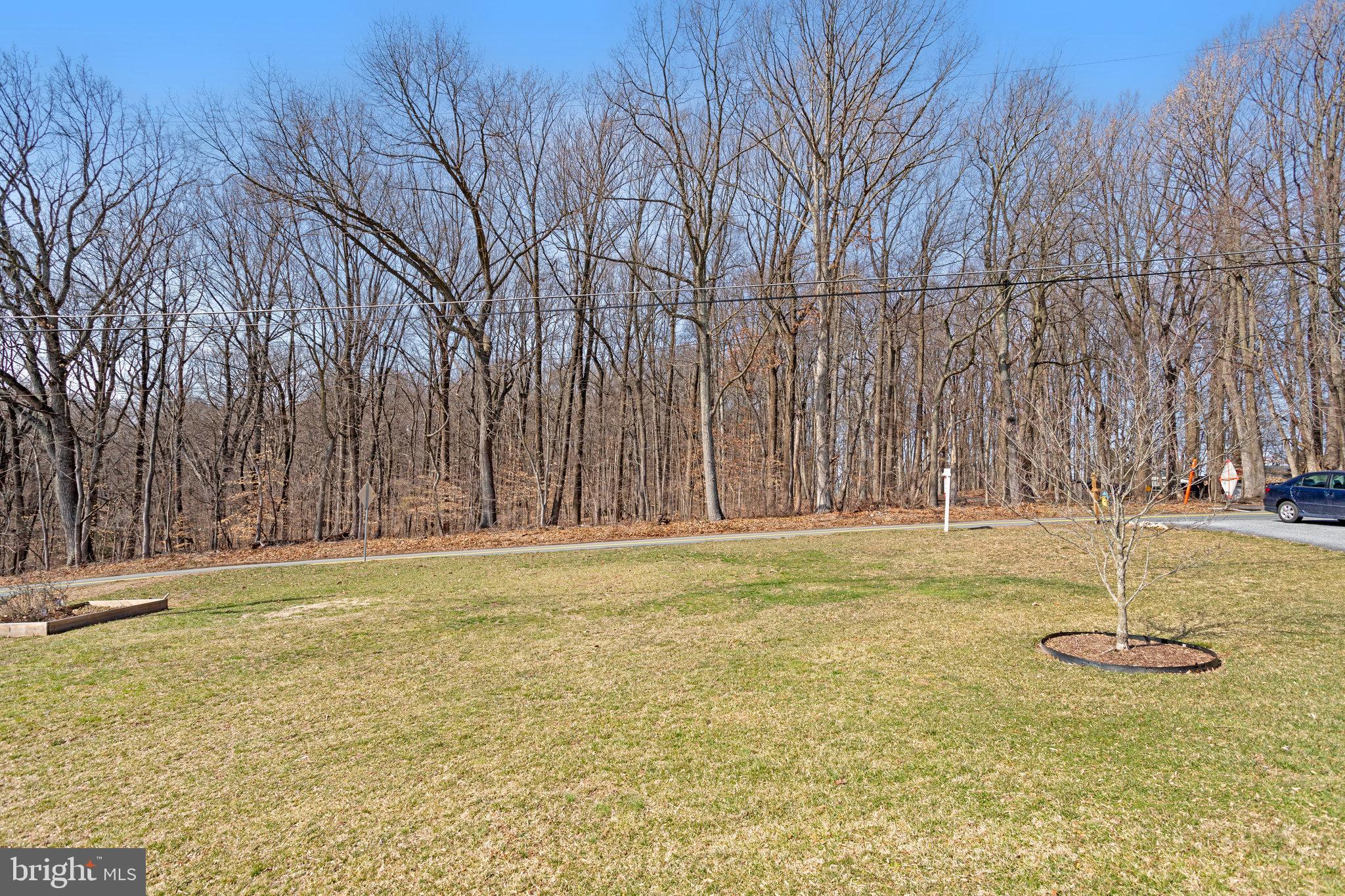 6343 Yeagertown Road New Market, MD 21774 - Photo 55 of 58 a view of a swimming pool with an outdoor space and seating area