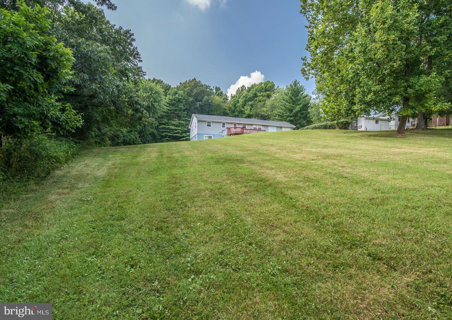 6343 Yeagertown Road New Market, MD 21774 - Photo 58 of 58 a view of a field with trees in the background