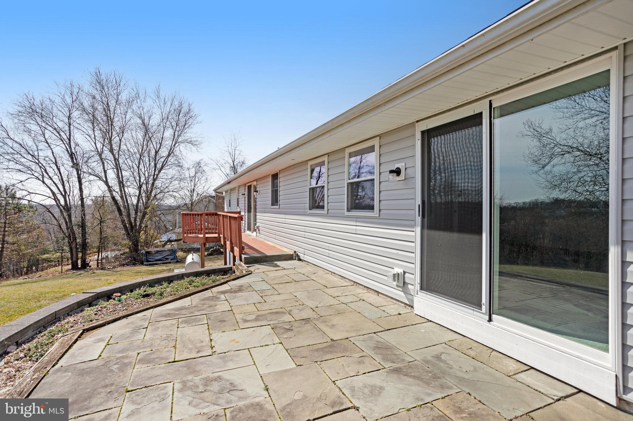 6343 Yeagertown Road New Market, MD 21774 - Photo 7 of 58 a building exterior with furniture
