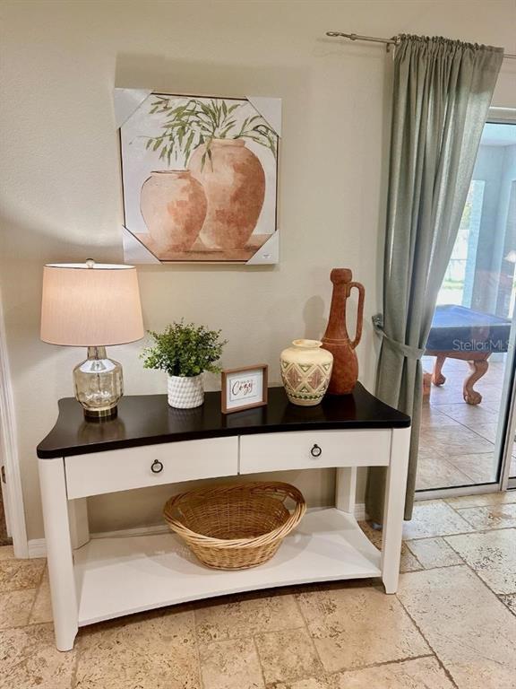 7 Lancaster Lane Palm Coast, FL 32137 - Photo 13 of 67 a bathroom with a sink and a mirror