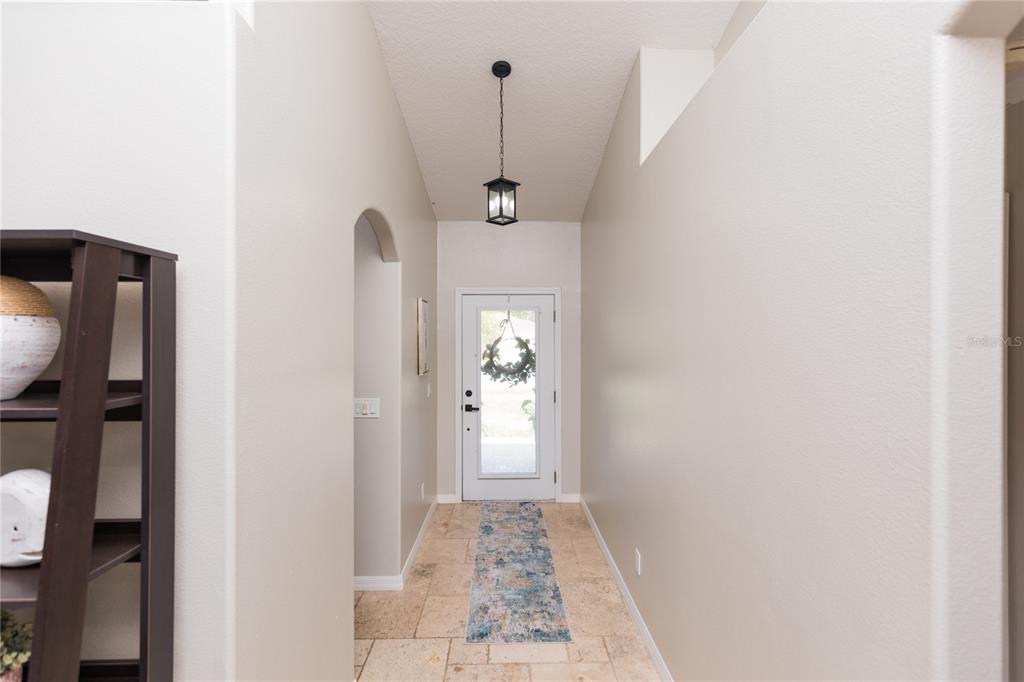 7 Lancaster Lane Palm Coast, FL 32137 - Photo 18 of 67 a view of a hallway with white walls