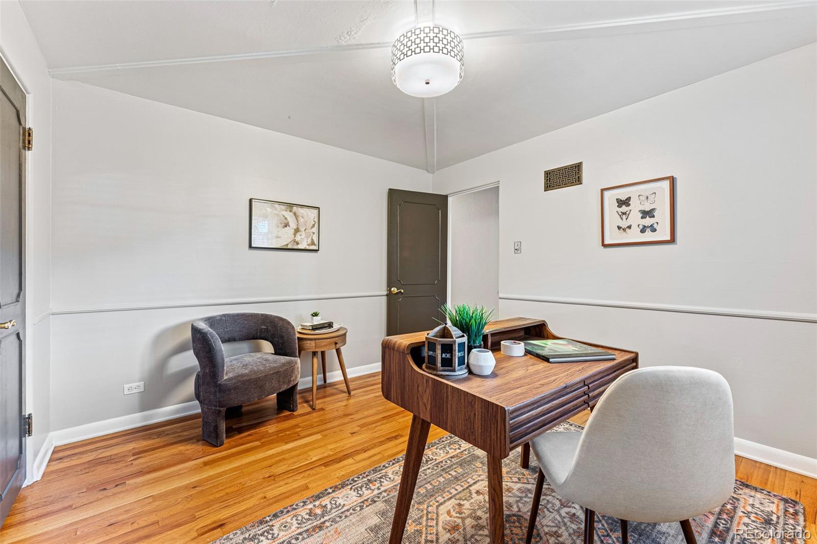 3715 Fenton Street Wheat Ridge, CO 80212 - Photo 8 of 13 a view of a livingroom with furniture and rug