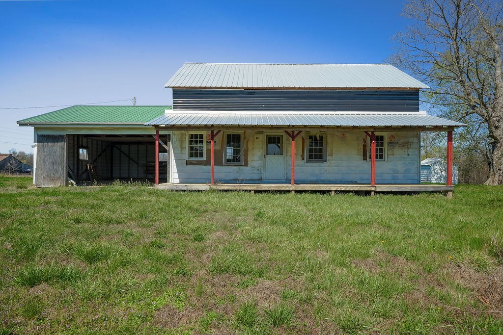 752 Stuart Chapel Road Lewisburg, KY 42256 - Photo 2 of 33 a view of a house with a backyard