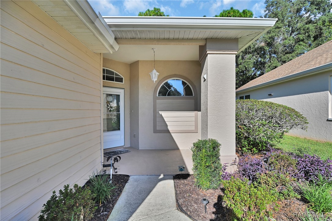 6 Byrsonima Loop Homosassa, FL 34446 - Photo 2 of 48 COVERED FRONT ENTRANCE