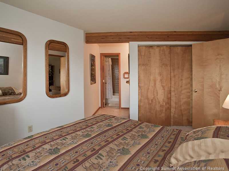 9490 Ryan Gulch Road, Unit 74 Silverthorne, CO 80498 - Photo 13 of 25 Master Bedroom.