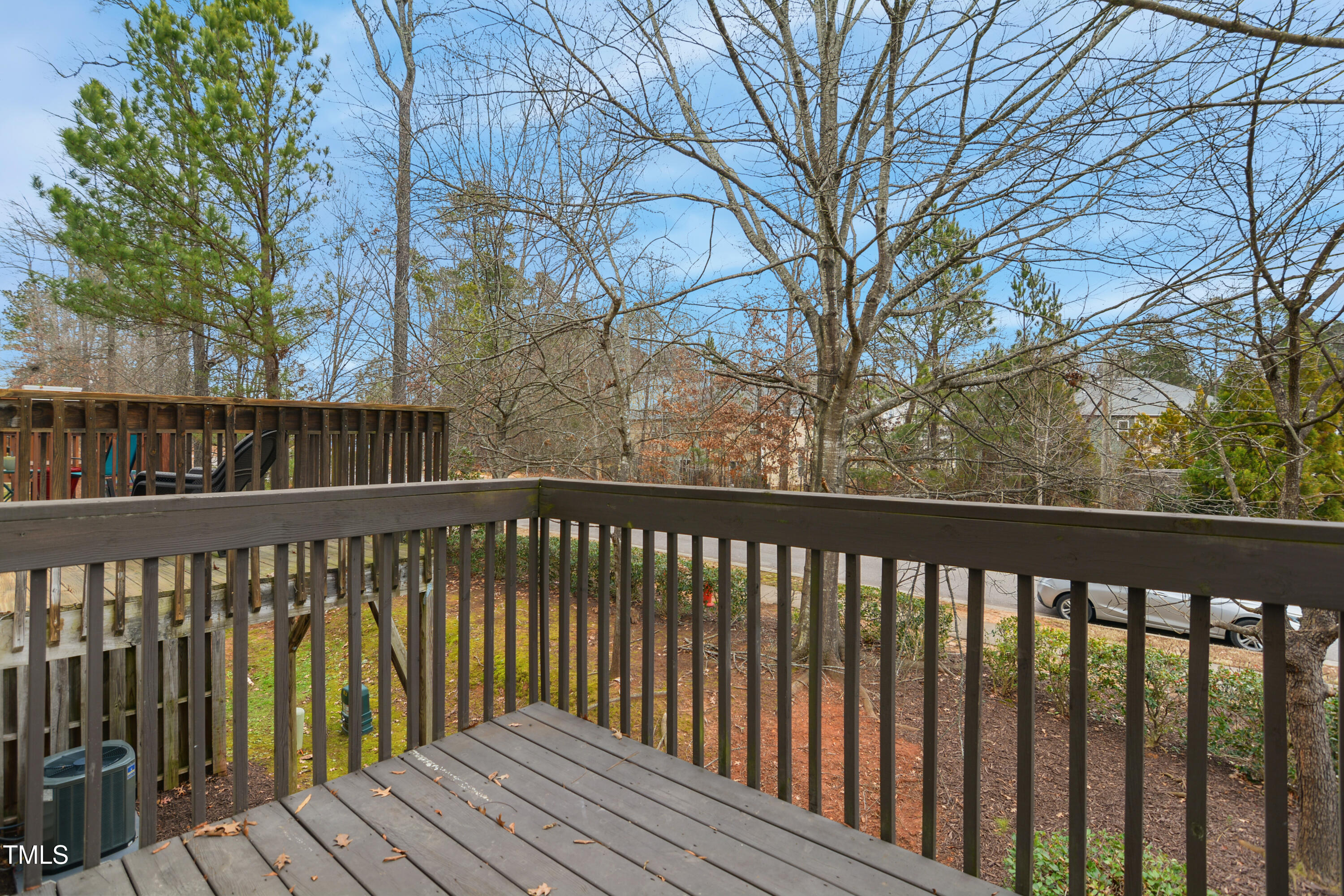 1673 Snow Mass Way Durham, NC 27713 - Photo 20 of 20 a balcony with wooden floor and fence