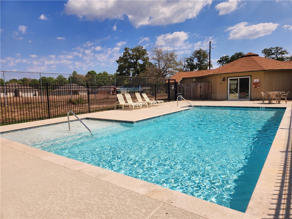 29044 Red Fox Hempstead, TX 77445 - Photo 17 of 25 a view of a backyard with a garden and deck