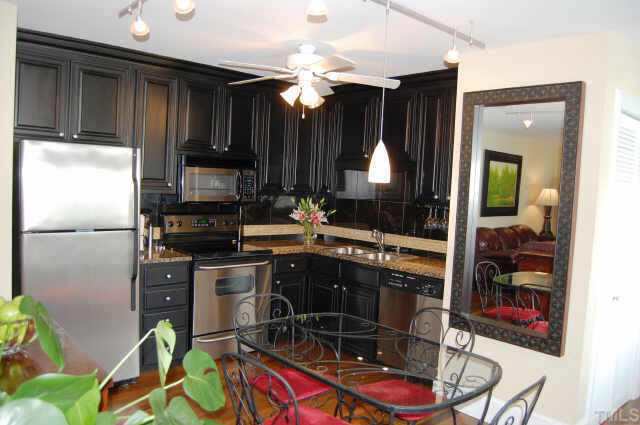2206 Stafford Avenue, Unit 201 Raleigh, NC 27607 - Photo 4 of 10 Kitchen with stainless steel appliances and granite counters Other