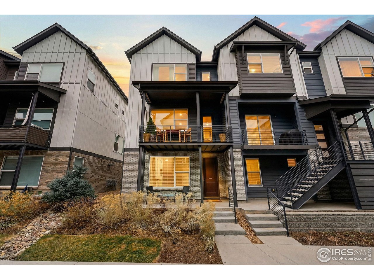 5189 Vivian Street Wheat Ridge, CO 80033 - Photo 2 of 39 End unit townhome! More light and privacy