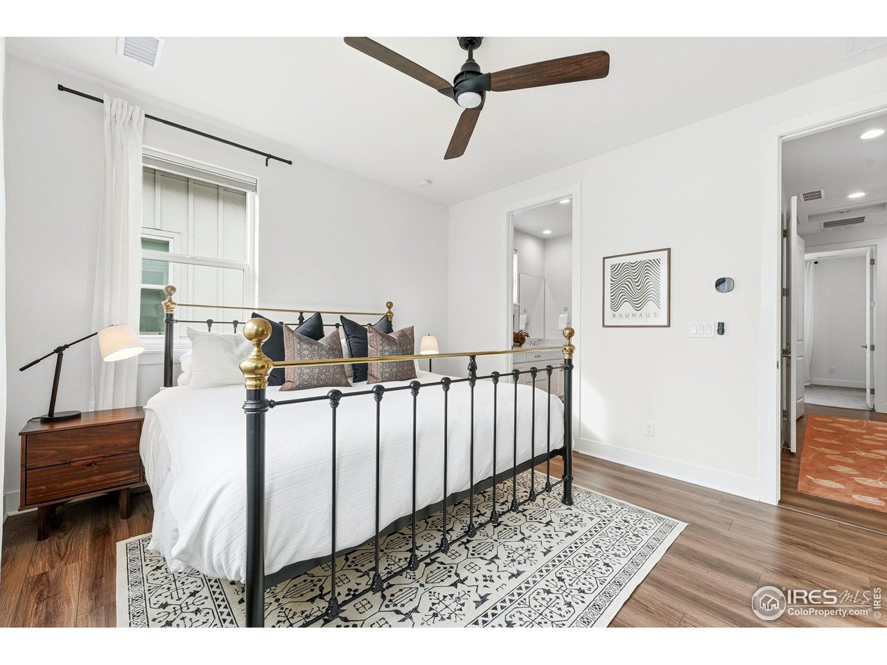 5189 Vivian Street Wheat Ridge, CO 80033 - Photo 23 of 39 Primary bedroom