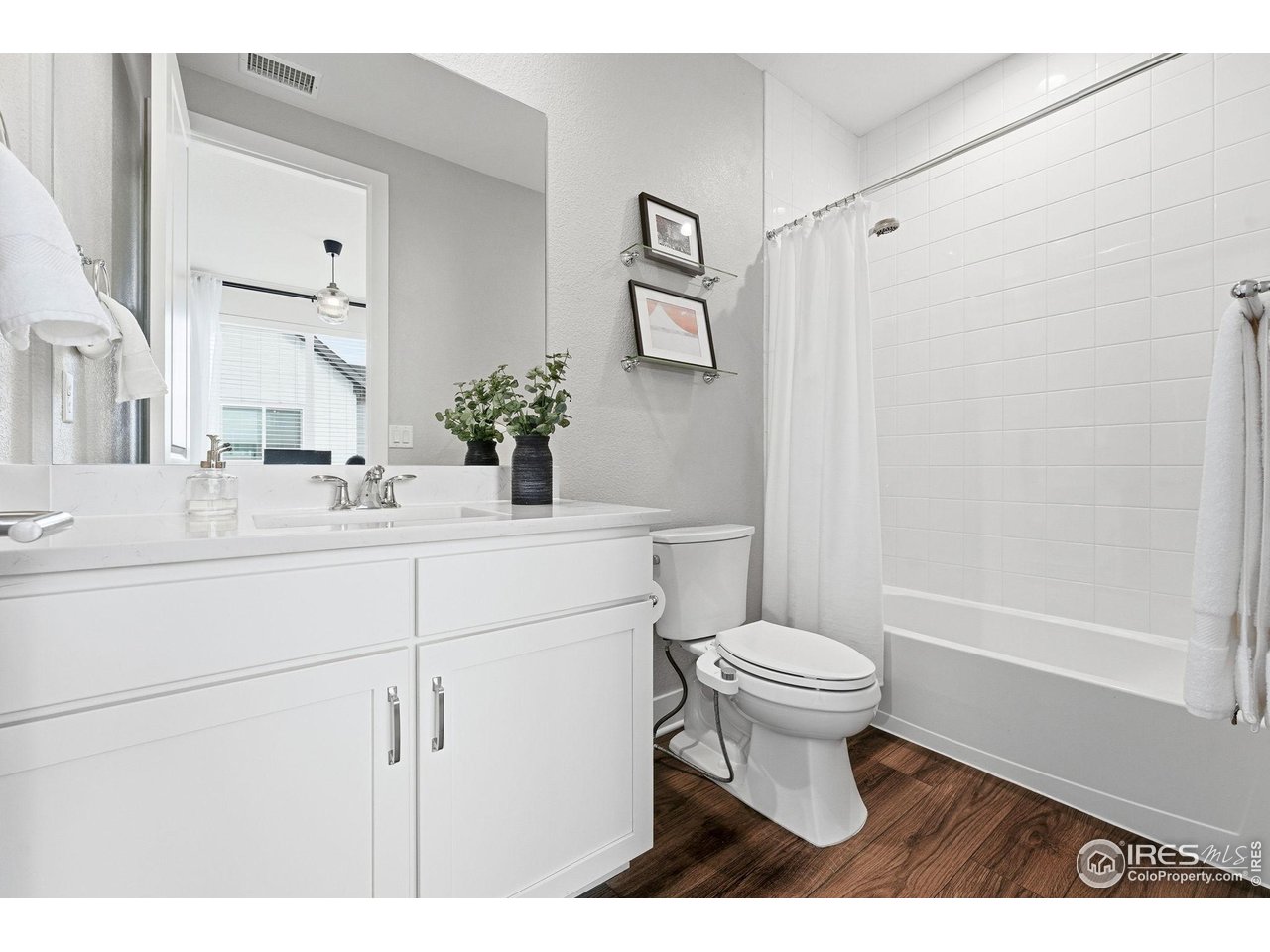 5189 Vivian Street Wheat Ridge, CO 80033 - Photo 31 of 39 En-suite full bathroom