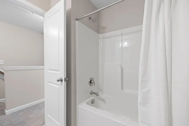 a bathroom with a bathtub