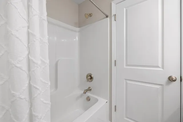 a bathroom with a bathtub