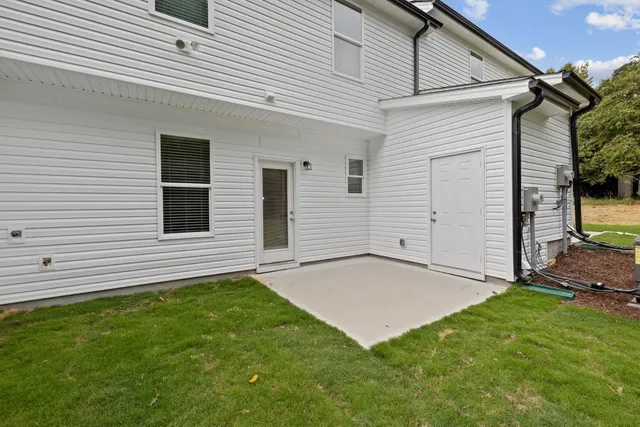 a view of backyard of a house