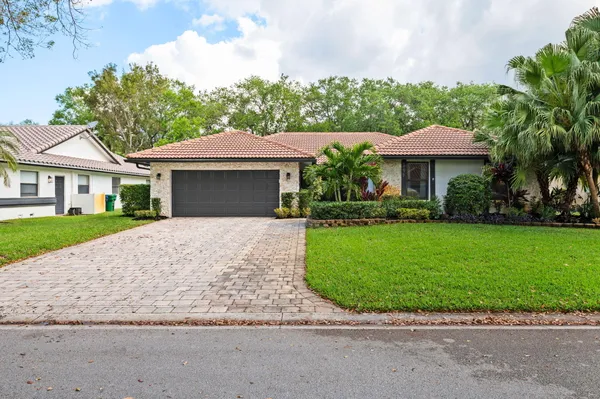$750,000 | 9077 Northwest 49th Place, Coral Springs, FL 33067