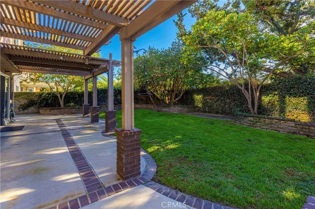 an aerial view of residential house with outdoor space and street view