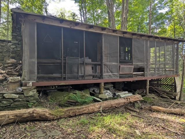 131 Old Plank Road Sparrowbush, NY 12780 - Photo 12 of 19 a backyard of a house with lots of green space