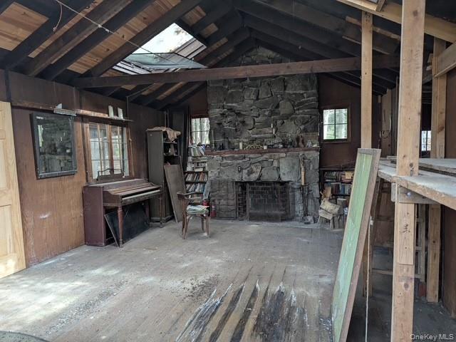 131 Old Plank Road Sparrowbush, NY 12780 - Photo 4 of 19 a view of a livingroom with furniture and a fireplace