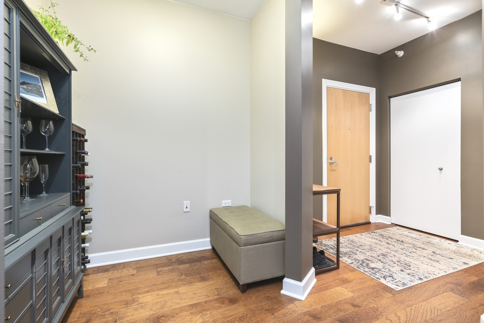 1629 South Prairie Avenue, Unit 2906 Chicago, IL 60616 - Photo 12 of 21 a living room with furniture and a rug