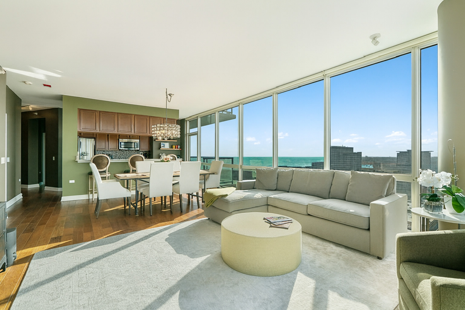 1629 South Prairie Avenue, Unit 2906 Chicago, IL 60616 - Photo 4 of 21 a living room with furniture and a large window