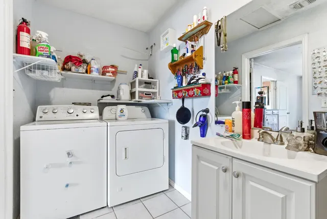 a utility room with dryer and washer