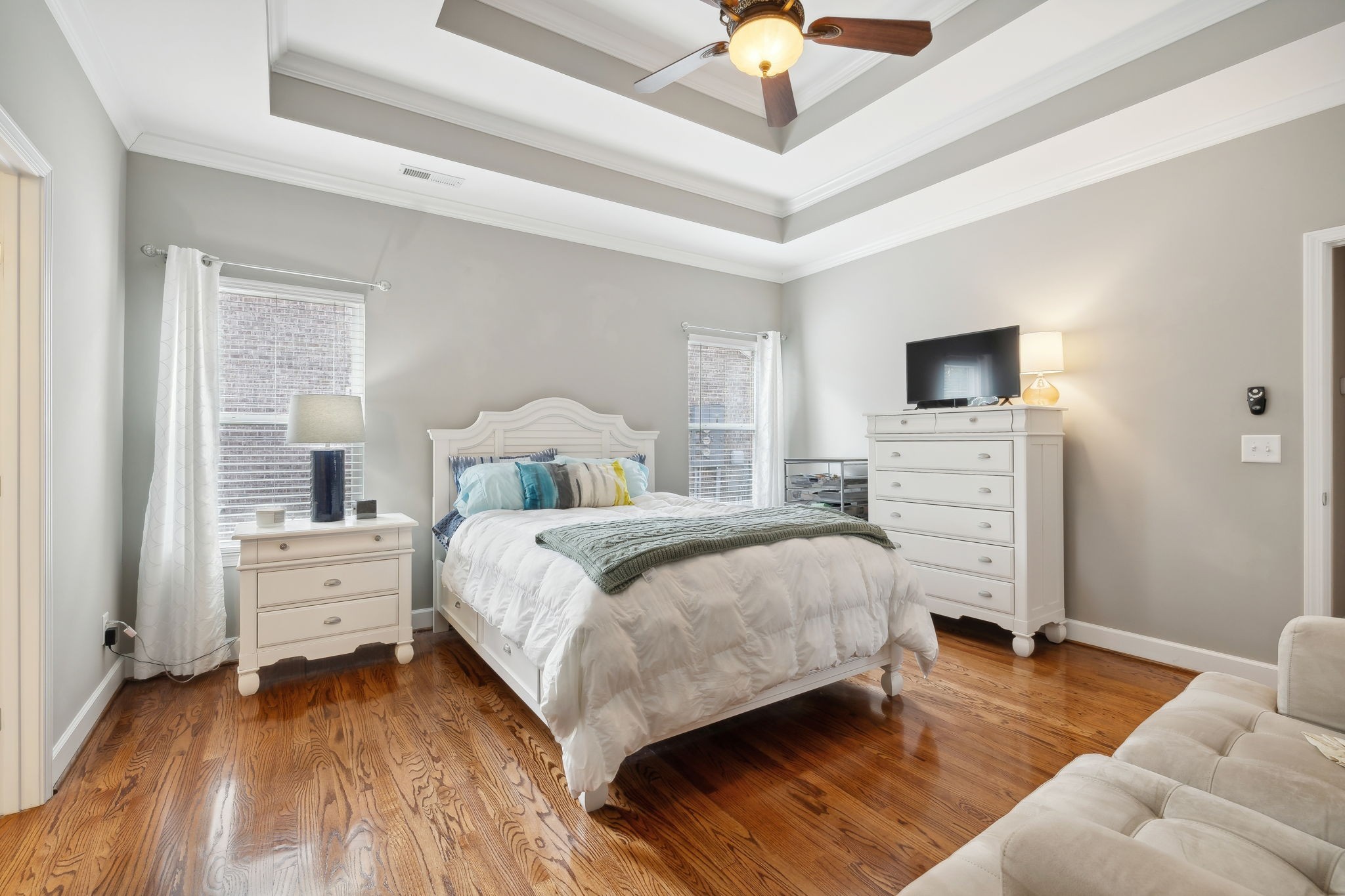 7126 Fernvale Springs Way Fairview, TN 37062 - Photo 19 of 35 a bedroom with a bed and a chandelier