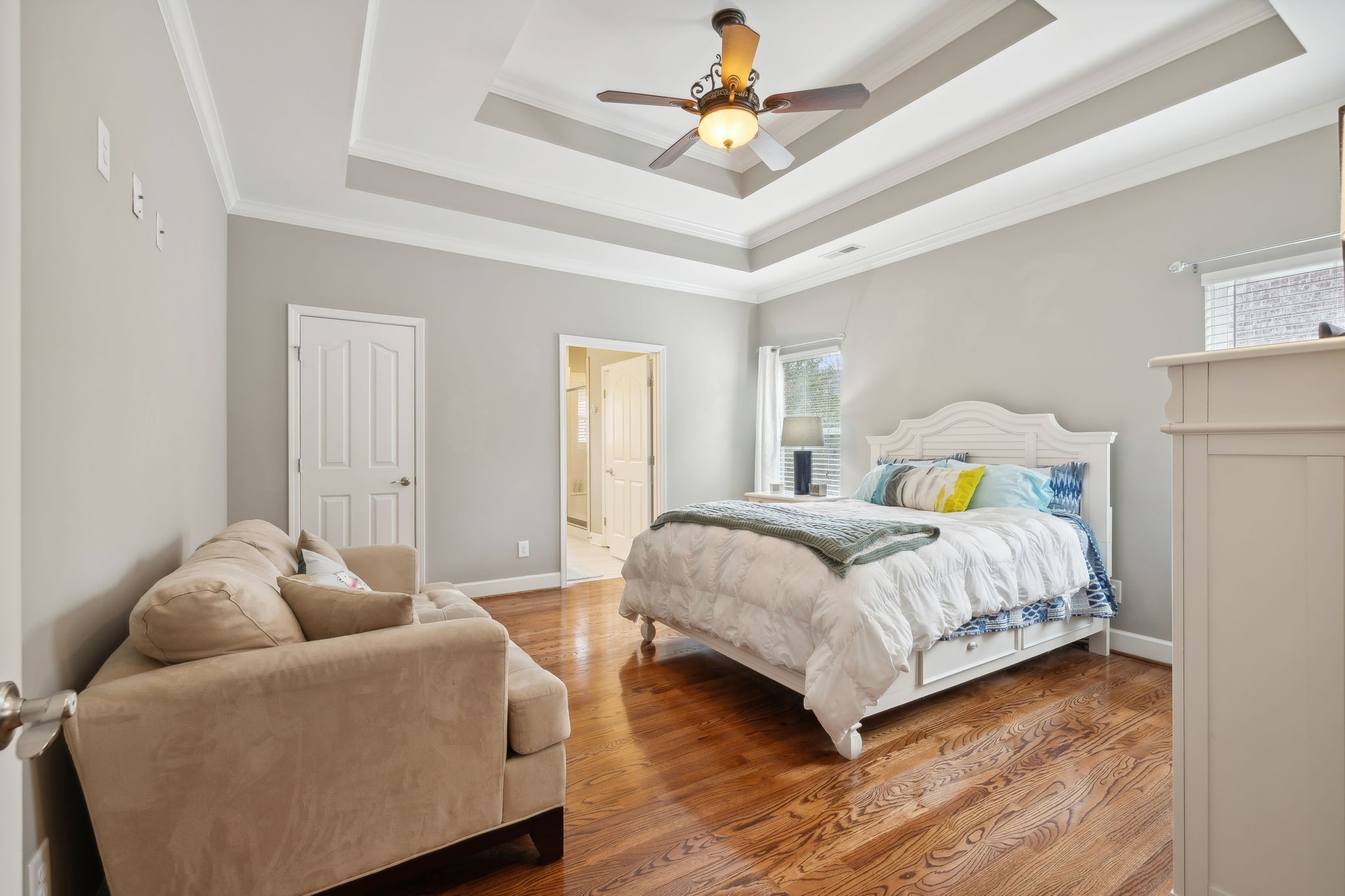 7126 Fernvale Springs Way Fairview, TN 37062 - Photo 20 of 35 a bedroom with a bed and a chandelier