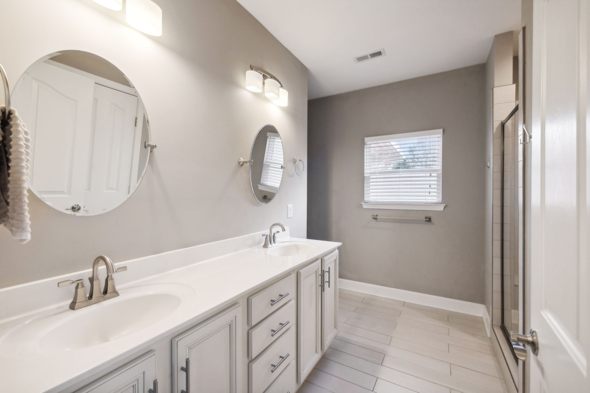 7126 Fernvale Springs Way Fairview, TN 37062 - Photo 22 of 35 a bathroom with a double vanity sink and a mirror