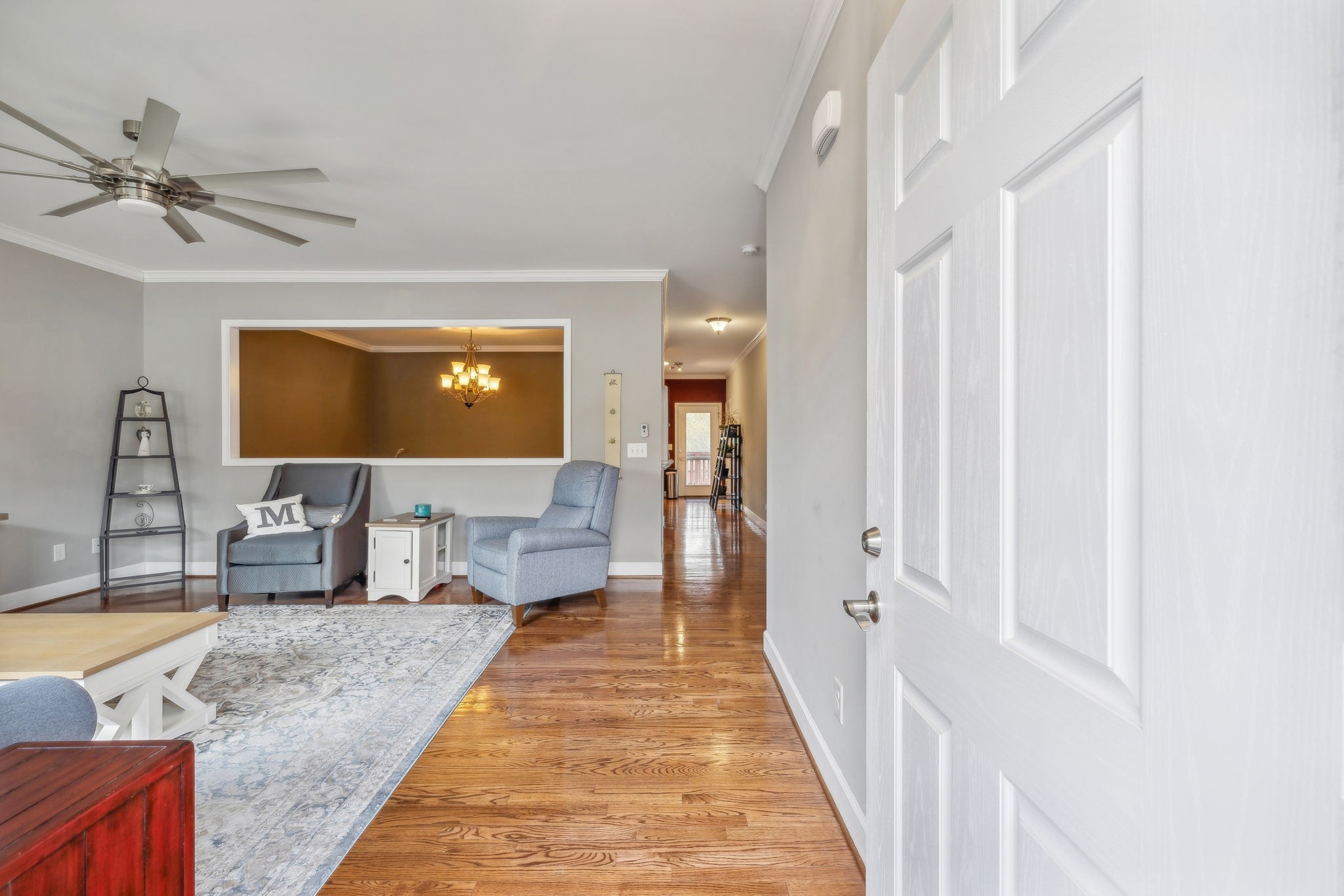 7126 Fernvale Springs Way Fairview, TN 37062 - Photo 5 of 35 a spacious bedroom with a bed and a chandelier