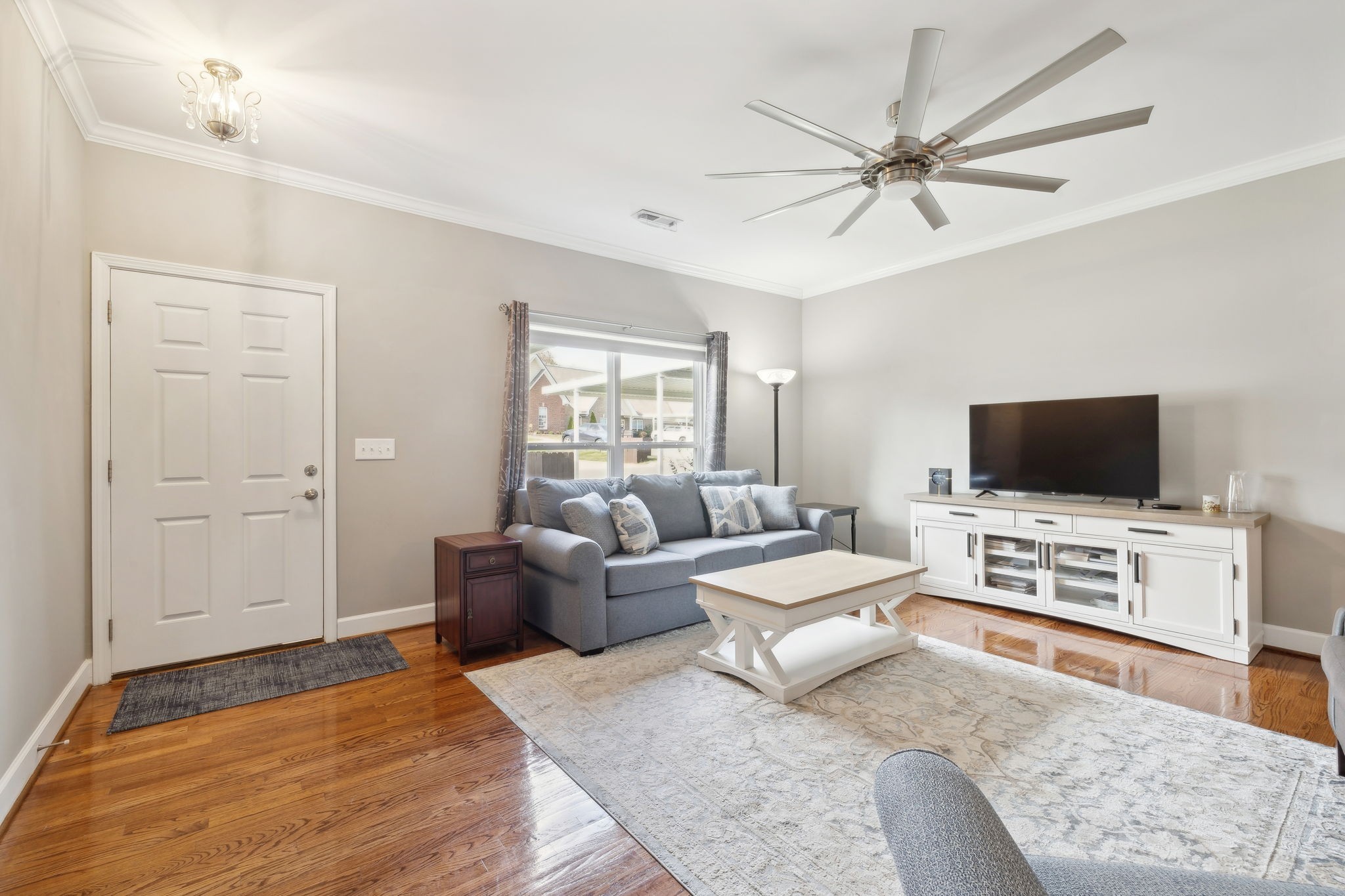 7126 Fernvale Springs Way Fairview, TN 37062 - Photo 8 of 35 a living room with furniture and a flat screen tv