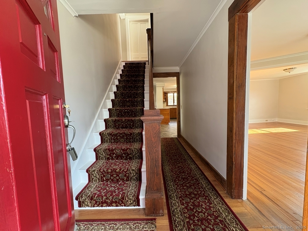16 Tracy Street Thomaston, CT 06787 - Photo 2 of 26 a view of entryway with wooden floor