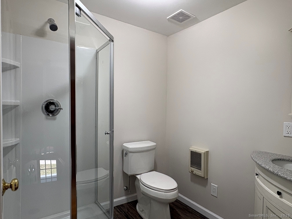 16 Tracy Street Thomaston, CT 06787 - Photo 24 of 26 a bathroom with a toilet and a shower