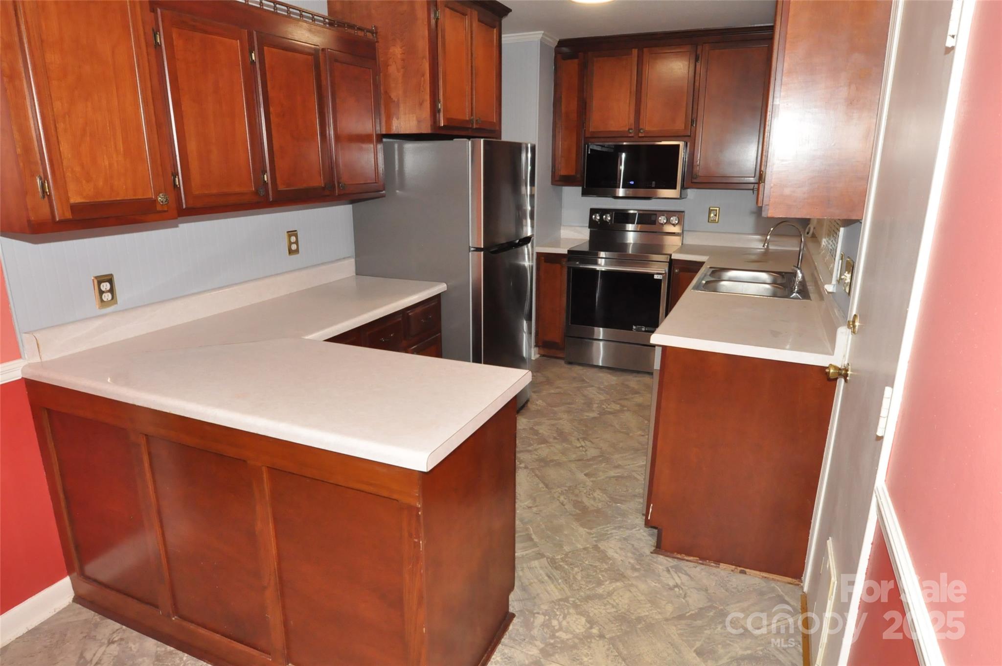 109 Hardin Street Chester, SC 29706 - Photo 11 of 25 a kitchen with a refrigerator sink and microwave