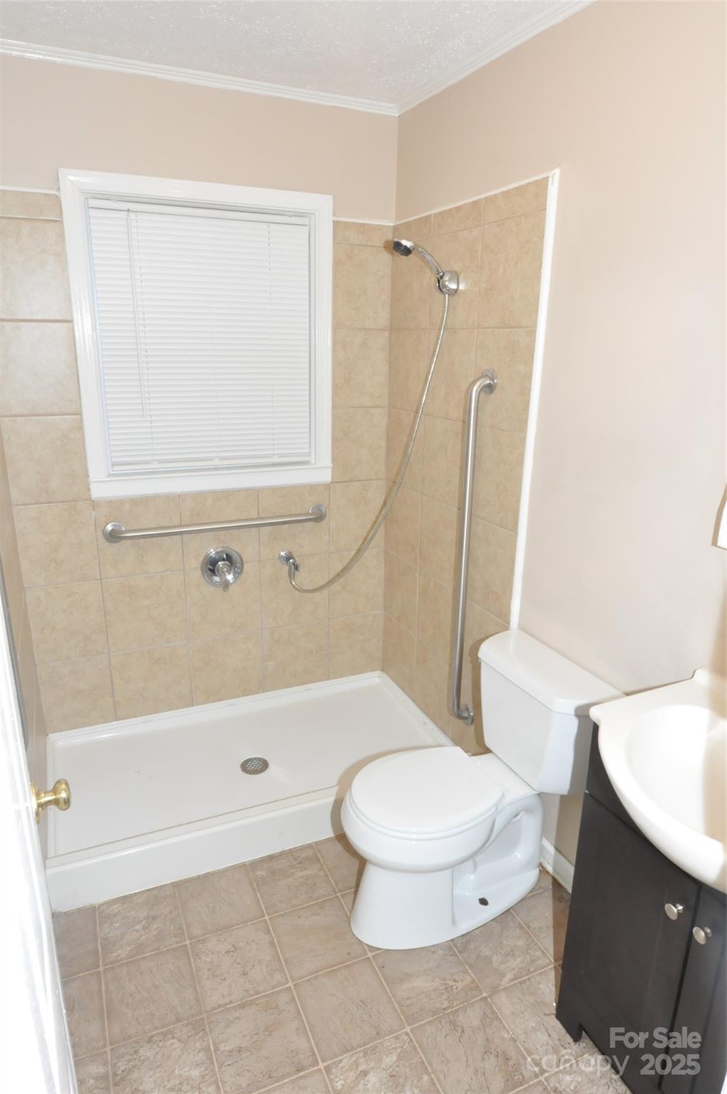 109 Hardin Street Chester, SC 29706 - Photo 14 of 25 a bathroom with a toilet and a shower