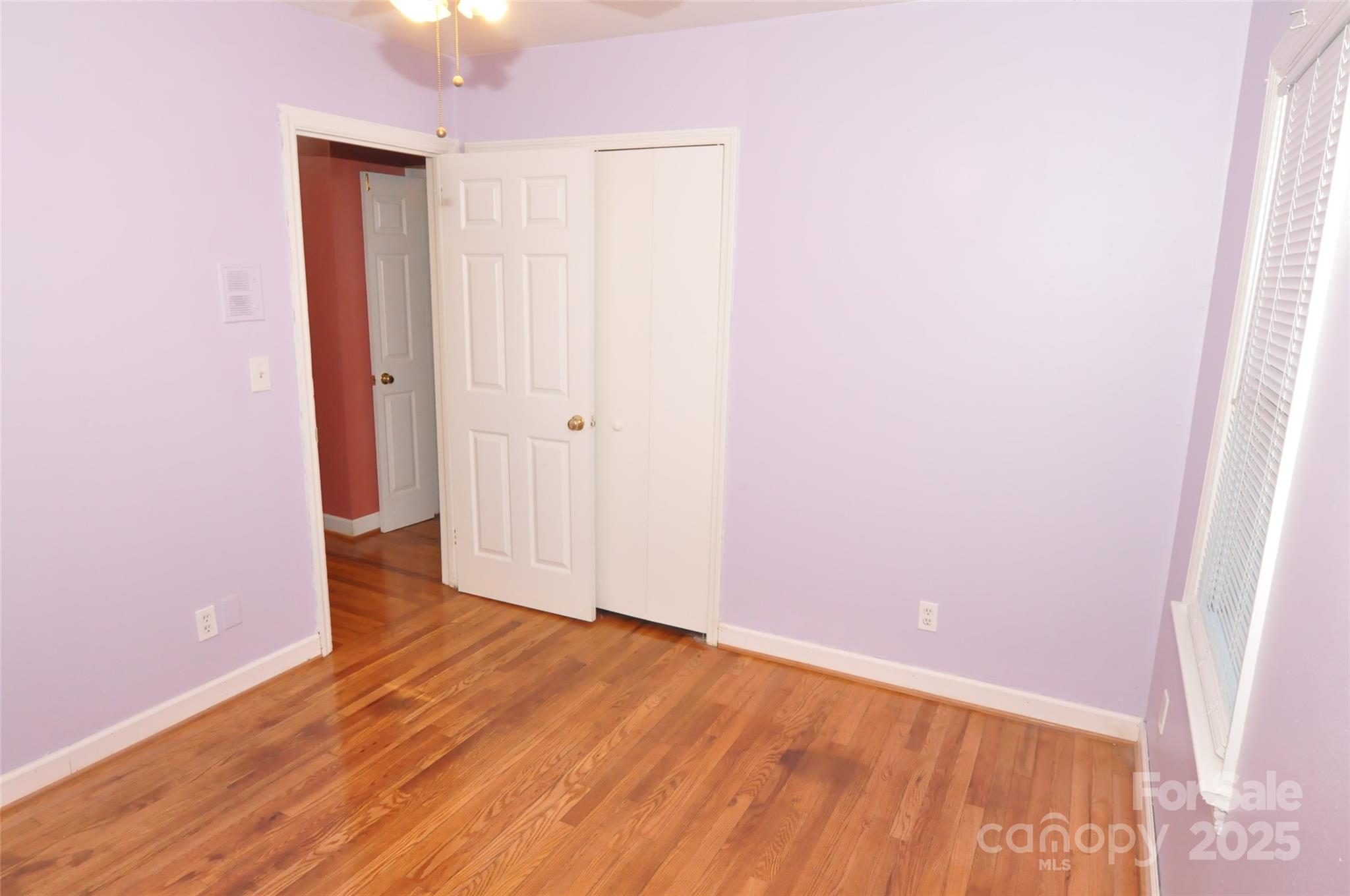 109 Hardin Street Chester, SC 29706 - Photo 16 of 25 a view of an empty room with wooden floor