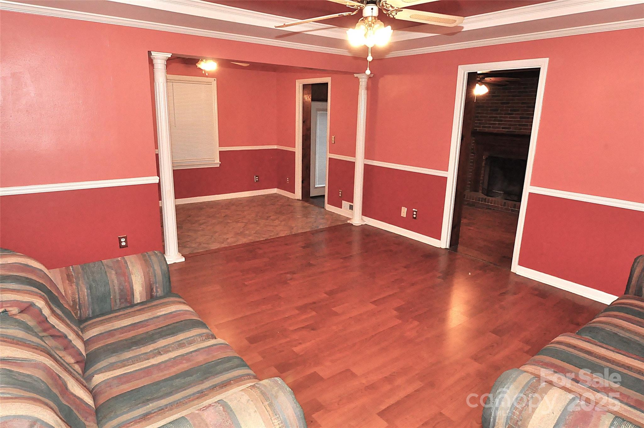 109 Hardin Street Chester, SC 29706 - Photo 5 of 25 a view of livingroom with furniture and wooden floor